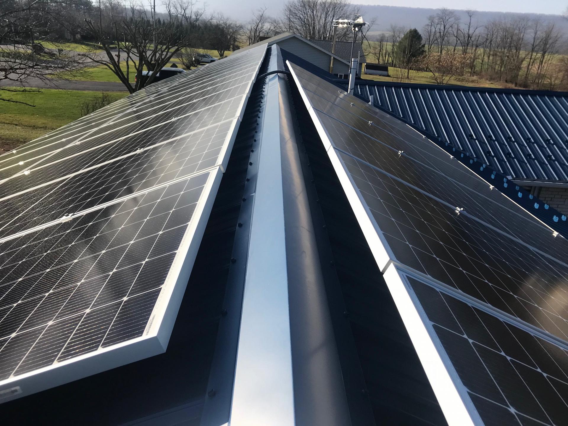 Peak of roof solar panels